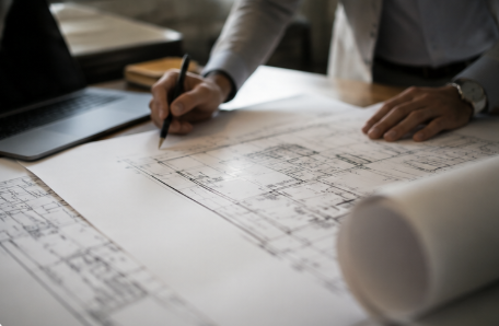 Construction plans being reviewed and marked during a preconstruction planning session